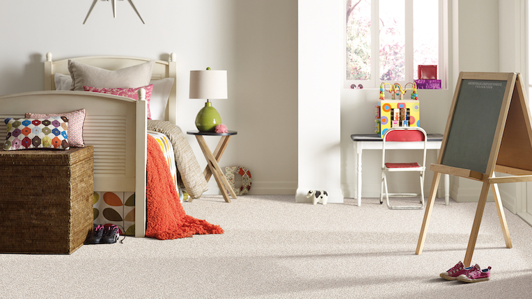 soft textured beige carpets in a cozy children's bedroom
